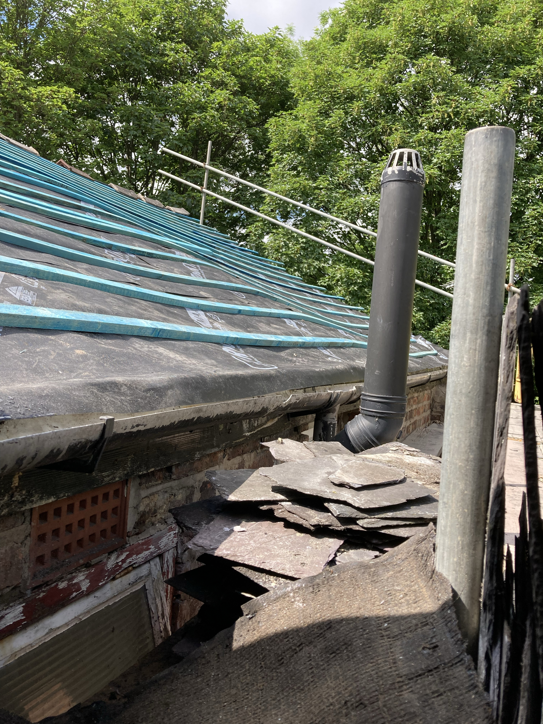 roof with tiles removed and new membrane and battens in place