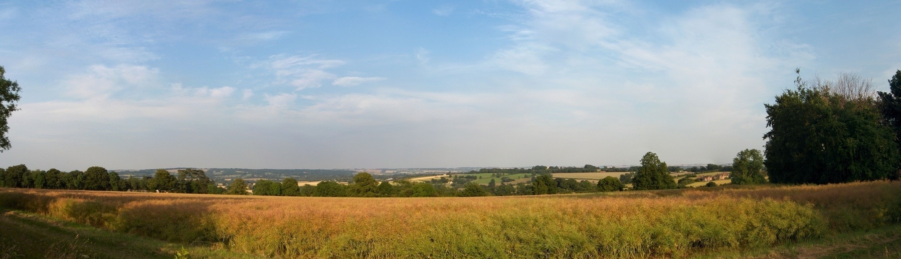 A panoramic view from Stow On The Wold across fields to Oxfordshire.