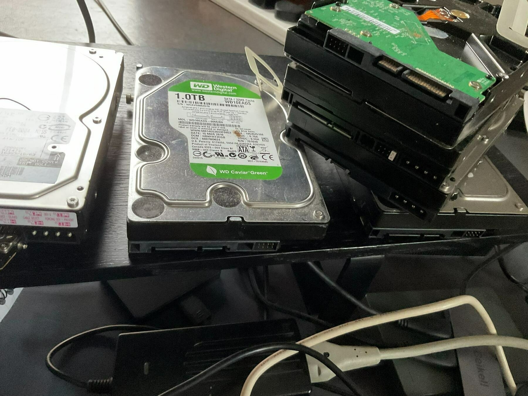 half a dozen uncased hard drives